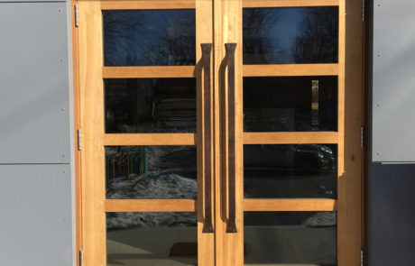 wood and glass exterior restaurant doors