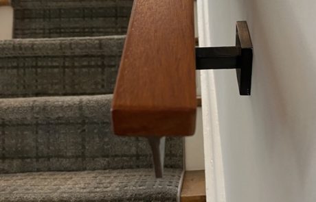 metal and wood stair hand railing